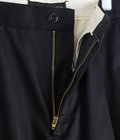 DOUBLE PLEATED CHINO TROUSERS