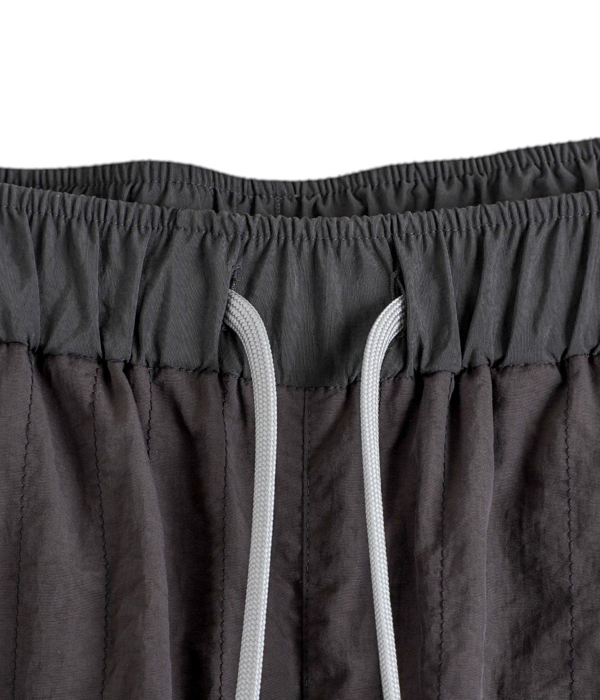NEW WIDE TWO TUCK PANTS (STITCHED NYLON) | S.F.C(エスエフシー 